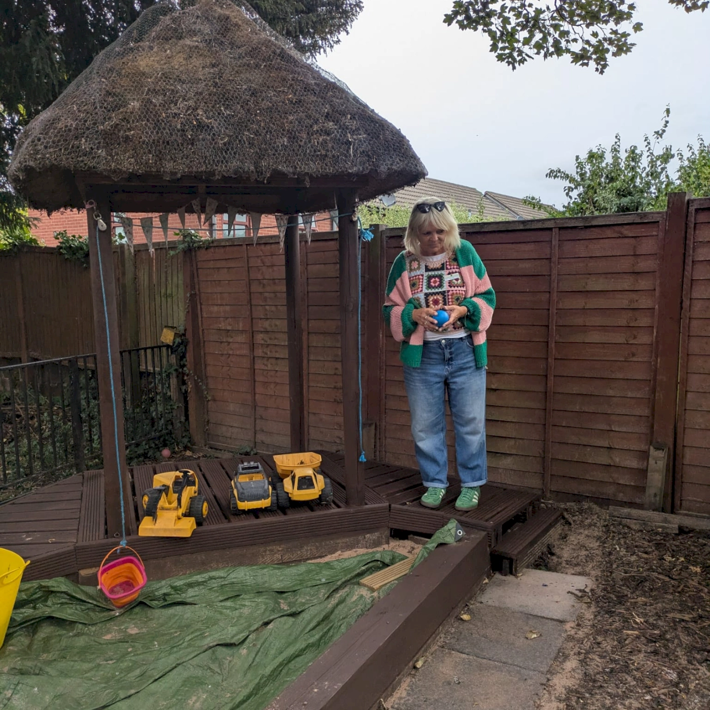 Shrewsbury child contact centre garden sandpit with volunteer